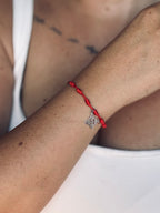 PULSERA 7 NUDOS ROJA CON NUDO DE BRUJA DE ACERO