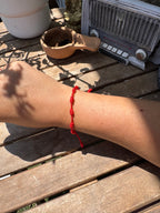 PULSERA 7 NUDOS ROJA