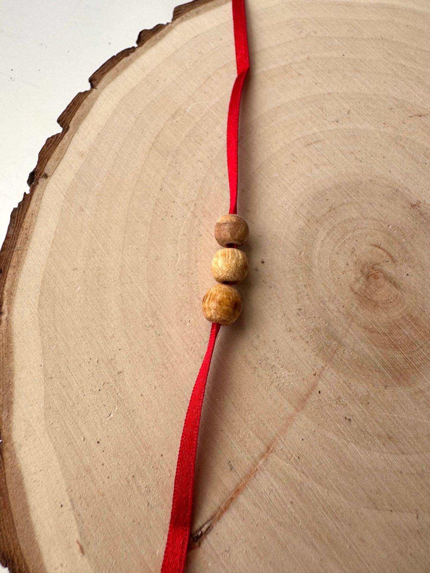 PULSERA LAZO ROJO PALO SANTO