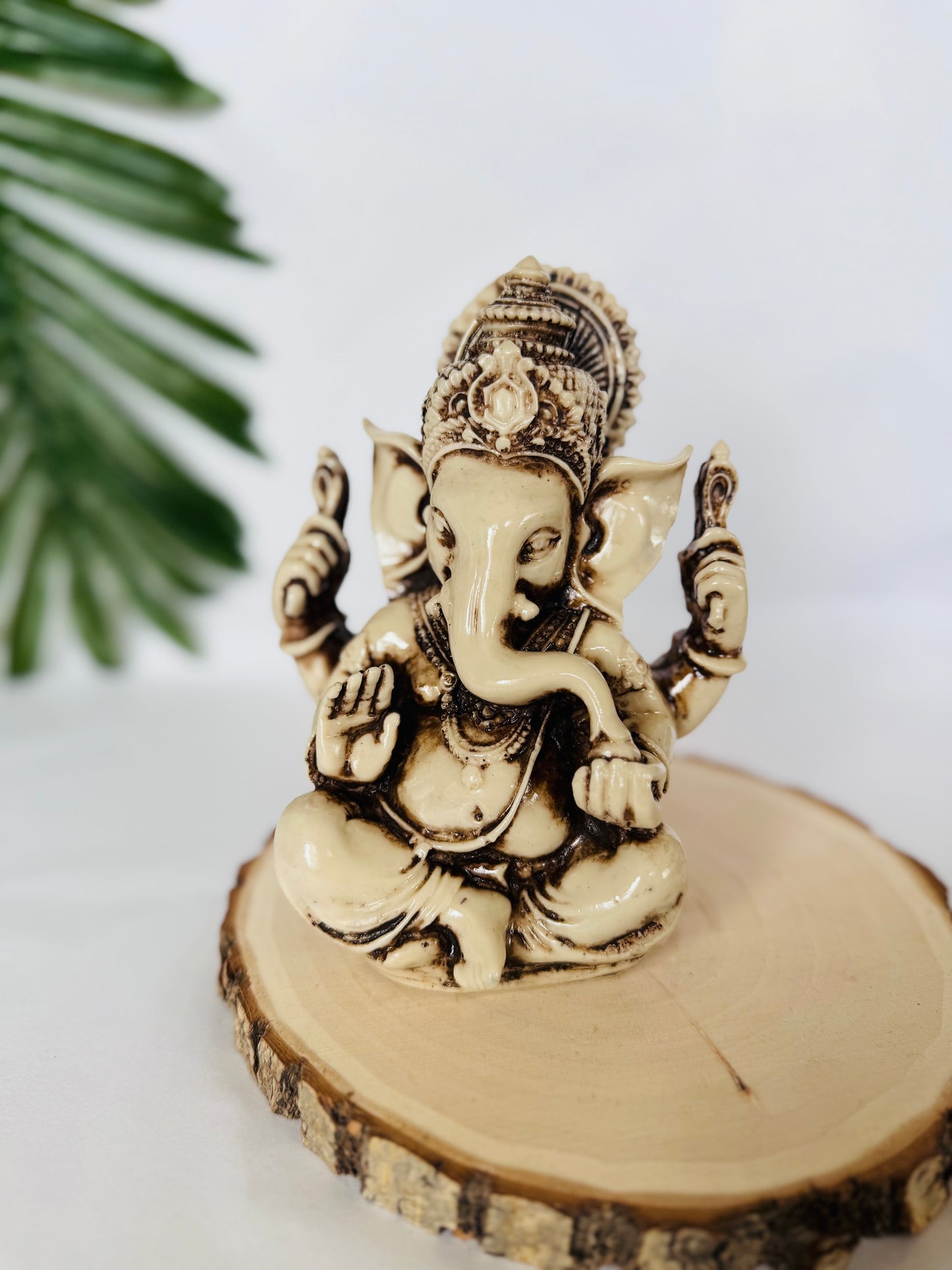 GANESHA ABRECAMINOS MARFIL 14CM