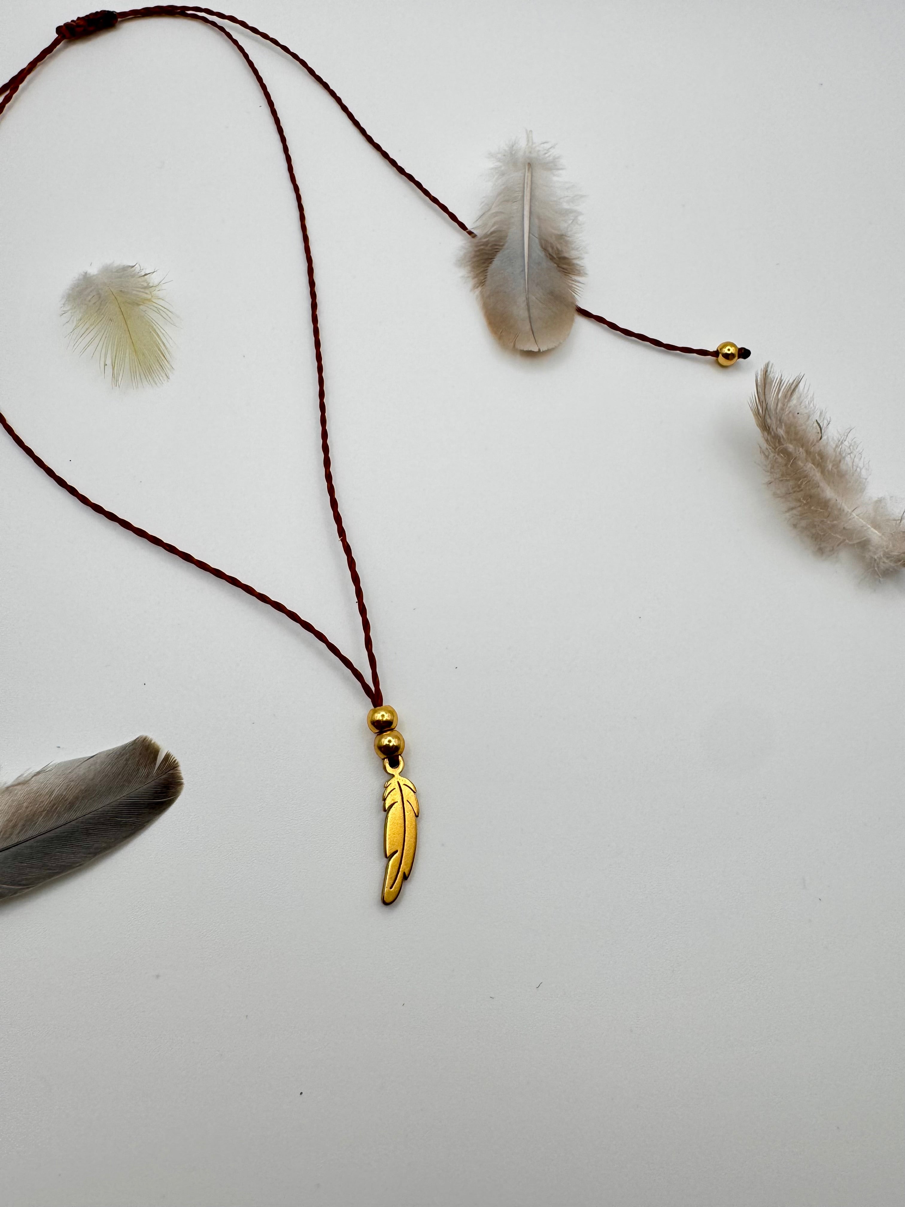 COLGANTE PLUMA MENSAJERA