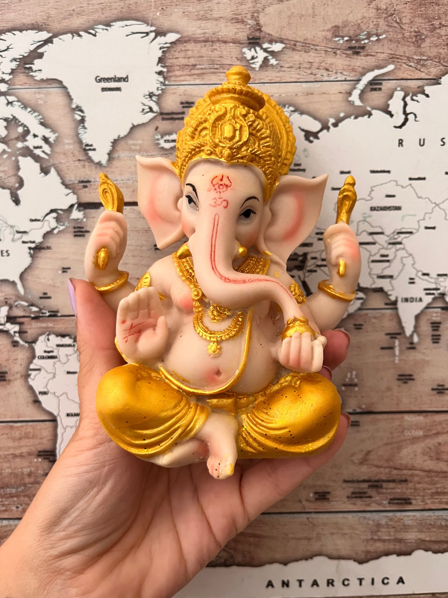 Ganesha dorada 14cm