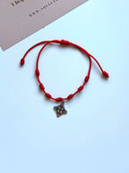 PULSERA 7 NUDOS ROJA CON NUDO DE BRUJA DE ACERO