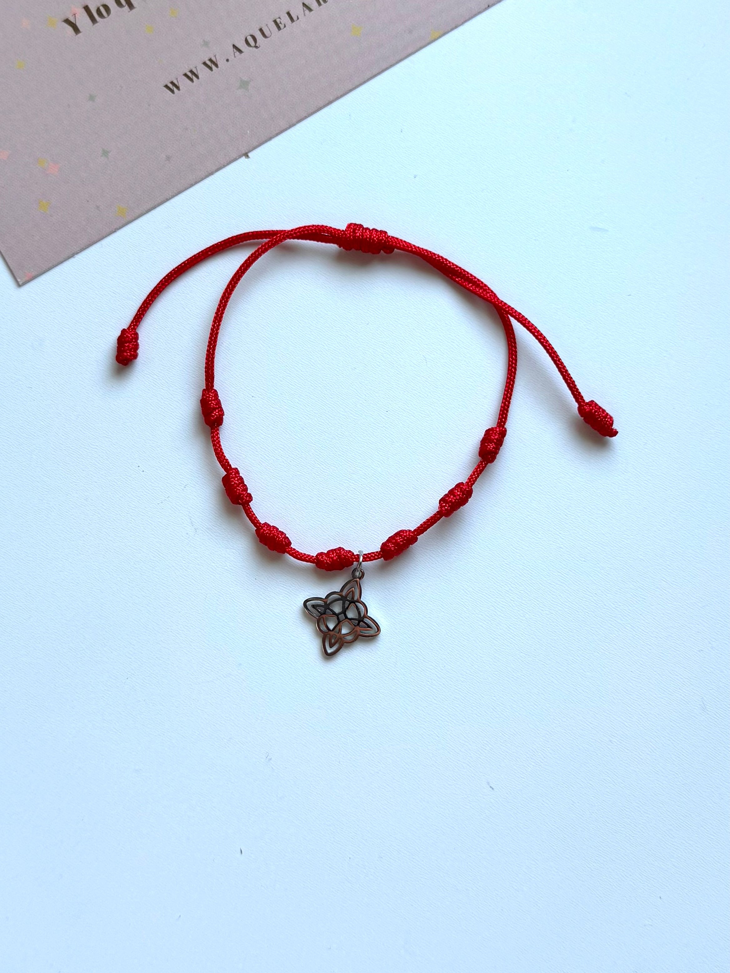 PULSERA 7 NUDOS ROJA CON NUDO DE BRUJA DE ACERO