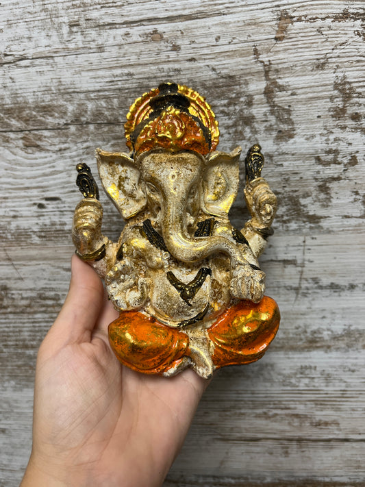 Ganesha naranja y dorada